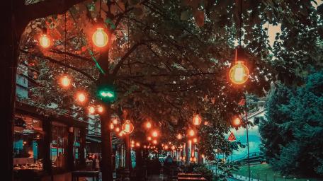 City Evening Glow with Charming Lanterns wallpaper