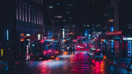 Neon Glow on Rain-Slick City Streets wallpaper