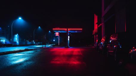 Neon Glow at the Nighttime Gas Station wallpaper