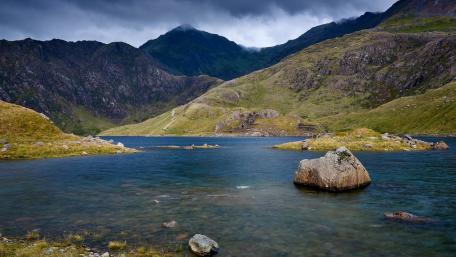 Majestic River Valley in Mountainous Landscape wallpaper
