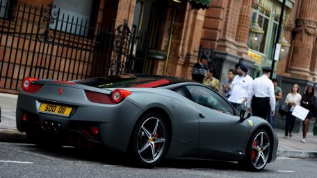 Sleek Ferrari 458 in Urban Setting wallpaper