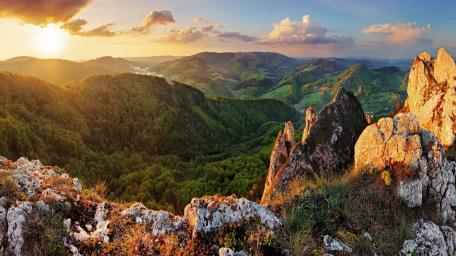 Majestic Sunset Over Serene Mountains wallpaper