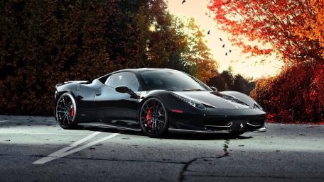 Sleek Ferrari 458 Against Autumn Backdrop wallpaper