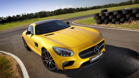 Sleek Yellow Mercedes-Benz AMG GT Wallpaper Showcase wallpaper