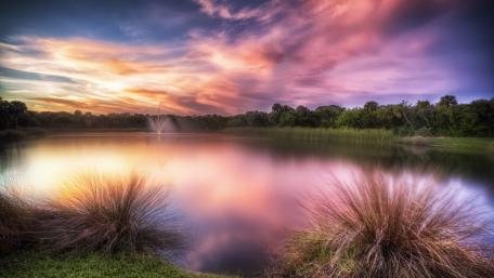 Serene Sunset Over Tranquil Lake wallpaper