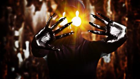 Eerie Alien Hands in the Dark wallpaper