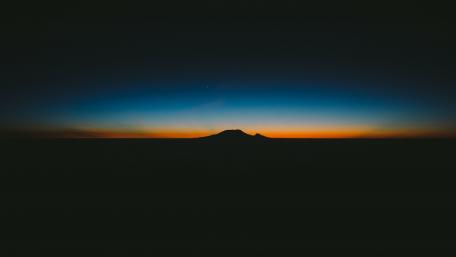 Sunset Over Majestic Mountain Silhouette wallpaper