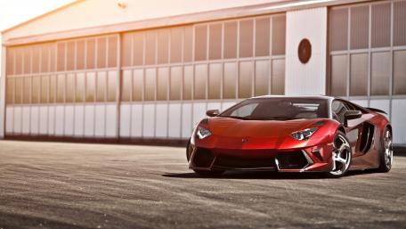 Sleek Lamborghini Aventador in Stunning Red Shade wallpaper