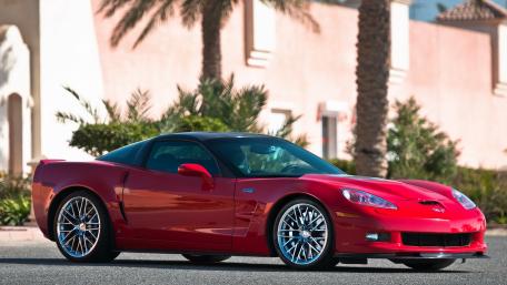 Sleek Red Chevrolet Corvette Wallpaper for Enthusiasts wallpaper