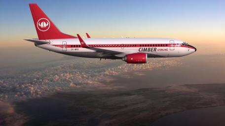 Boeing 737 in Flight Above the Clouds wallpaper