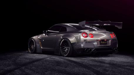Sleek Nissan GT-R in Dynamic Dark Atmosphere wallpaper