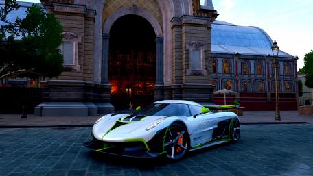 Sleek Supercar in Urban Setting wallpaper