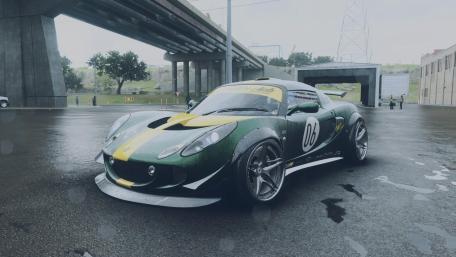 Sleek Race Car in the Rainy Street Scene wallpaper