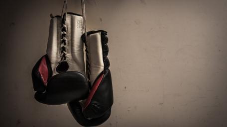 Boxing's Timeless Symbol of Strength and Resilience wallpaper