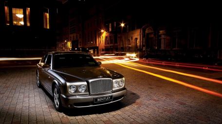 Elegant Bentley Arnage in a City Night Scene wallpaper