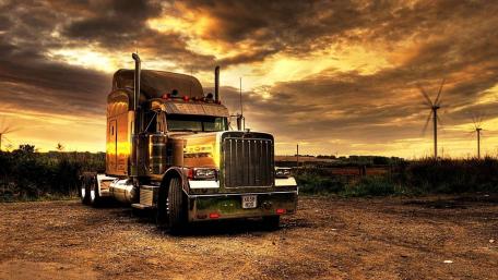 Sunset Journey with Peterbilt Truck wallpaper