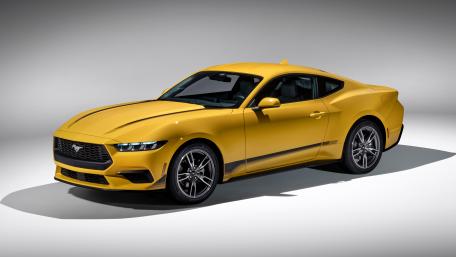 Vibrant Yellow Ford Mustang Sport Car Wallpaper wallpaper
