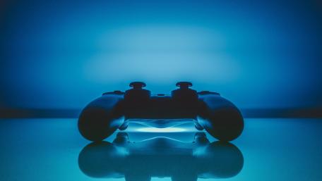 Gaming Controller Under Blue Light wallpaper