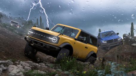 Epic Off-Road Adventure in Stormy Landscape wallpaper