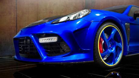 Sleek Blue Porsche Sports Car Wallpaper wallpaper