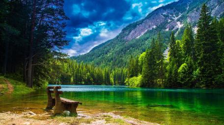 Mountain Serenity with Riverside Bench wallpaper