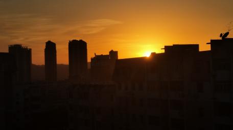 Golden Hour Serenity Over Cityscape Moments wallpaper