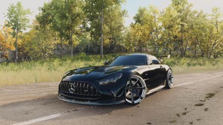 Sleek Mercedes in Nature's Embrace wallpaper