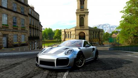 Sleek Porsche on Serene Streets in 4K Resolution wallpaper