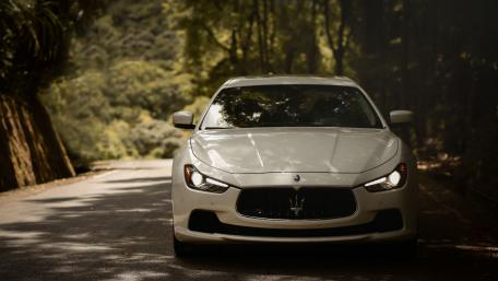 Maserati Ghibli in Serene Forest Drive wallpaper