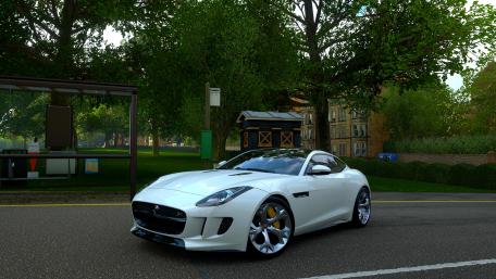 Sleek White Sports Car in Urban Landscape wallpaper