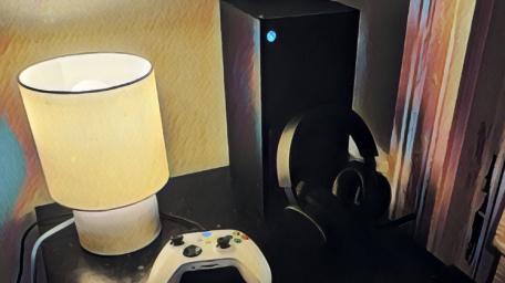Cozy Gaming Setup with Modern Tech Amenities wallpaper