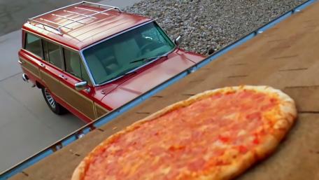 Pizza on the Roof with a Classic Car Below wallpaper