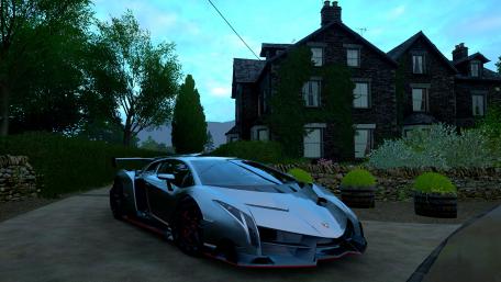 Sleek Luxury Supercar in Beautiful Setting wallpaper