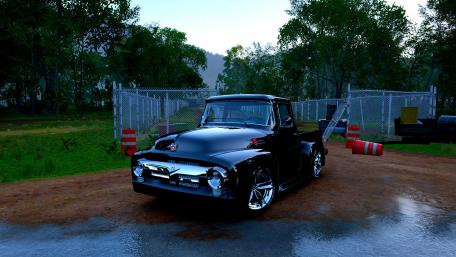 Classic Black Pickup Truck in Serene Landscape View wallpaper