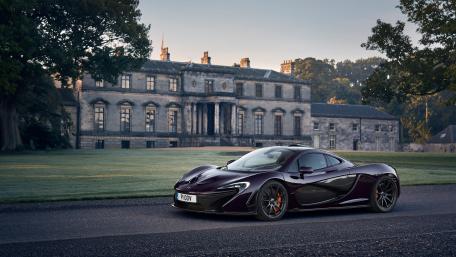 McLaren P1 in Front of Majestic Mansion wallpaper