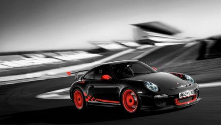 High-Speed Elegance on the Racetrack wallpaper