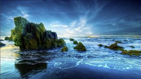 Rocky Seascape Serenity at Twilight wallpaper