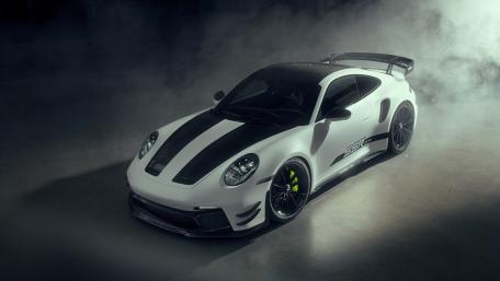Sleek White Porsche 911 in Dim Light wallpaper
