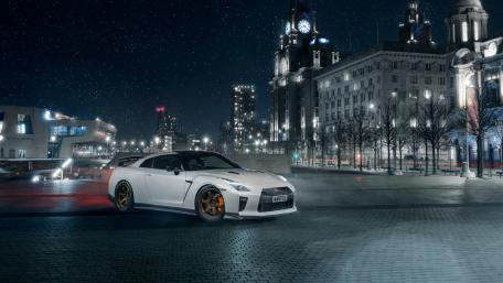 Sleek Nissan GT-R Under Starry Night Sky wallpaper