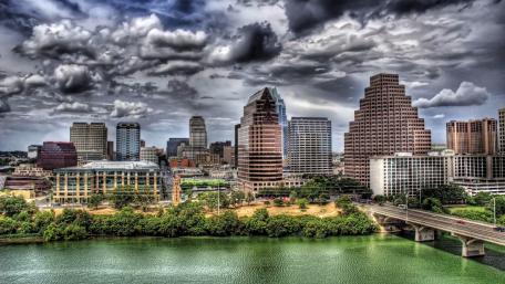 Austin Skyline Under Dramatic Clouds wallpaper