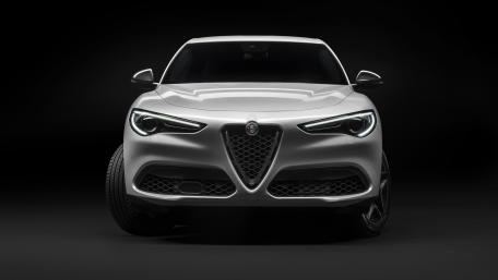 Sleek Alfa Romeo SUV in Striking Front View wallpaper