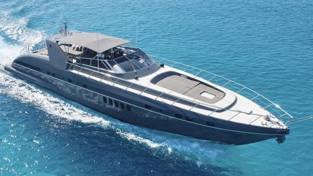 Sleek Motorboat Navigating Crystal Waters wallpaper