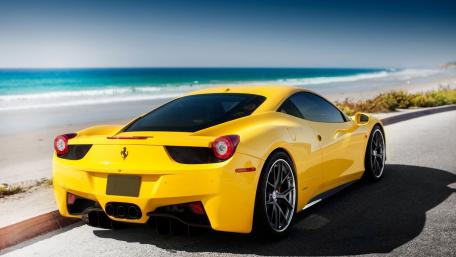 Vibrant Ferrari 458 by the Shoreline wallpaper