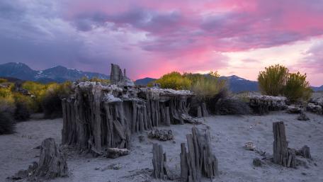 Stunning Landscape with Pink Clouds and Unique Rock Formations wallpaper