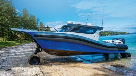 Sleek Fishing Vessel on the Shoreline wallpaper