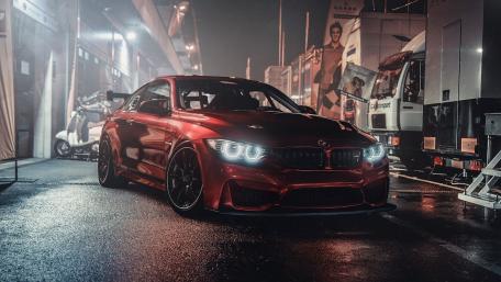 Sleek BMW in Nighttime Action wallpaper