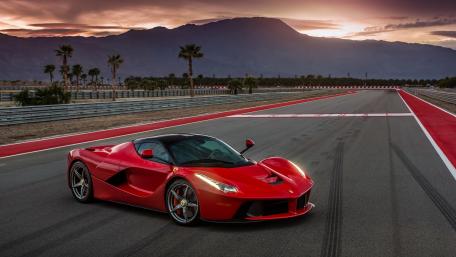 Stunning Ferrari LaFerrari Against a Sunset Background wallpaper