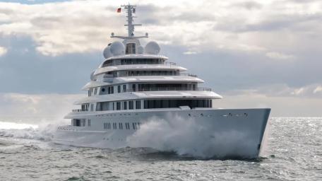 Elegant Superyacht Gliding Through Waves wallpaper