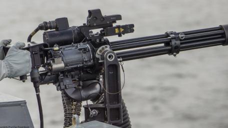 M134 Minigun in Action on Military Vessel wallpaper