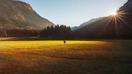 Serene Valley Under Sunlit Skies wallpaper